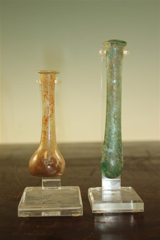 Two Roman glass unguentarium, c.2nd century A.D., 12.5 and 9.5cm